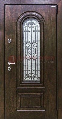Темная филенчатая железная дверь со стеклом и ковкой ДСК-102 в Климовске
