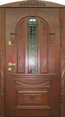 Узорная железная дверь массив со стеклом и ковкой ДСК-247 в Климовске
