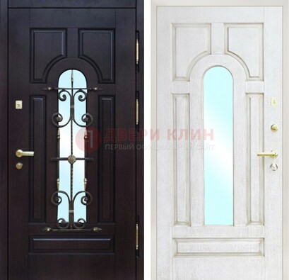 Металлическая дверь со стеклом и ковкой ДСК-55 в частный дом в Мурманске